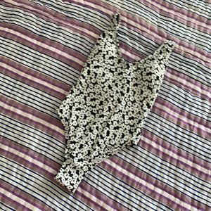 Flowered cross-back Lulu’s one piece bathing suit.